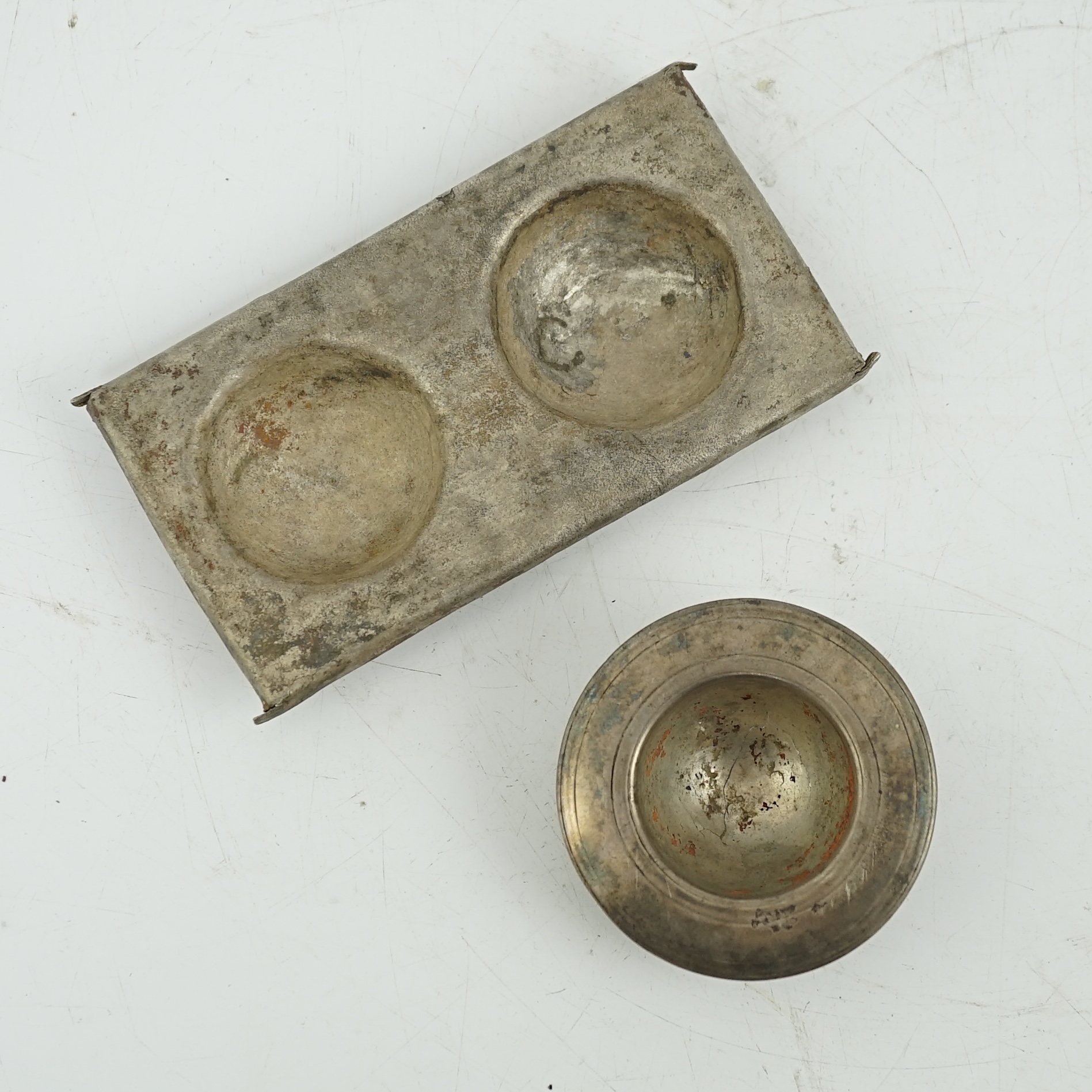 A silver tray and cup, Roman or Gandhara, c. late 1st century BC - early 1st century A.D.